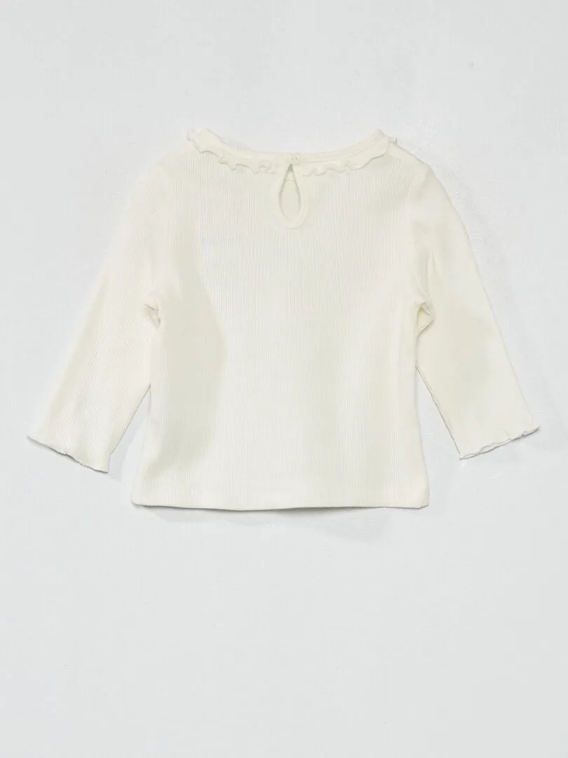 CAMISETA DE PUNTO DE CANALé CON VOLANTE EN EL CUELLO  BLANCO
