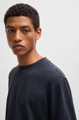 Camiseta relaxed fit de algodón aterciopelado con detalle de logo