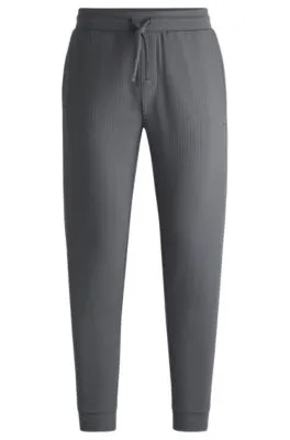 Pantalones de pijama de algodón con logo bordado