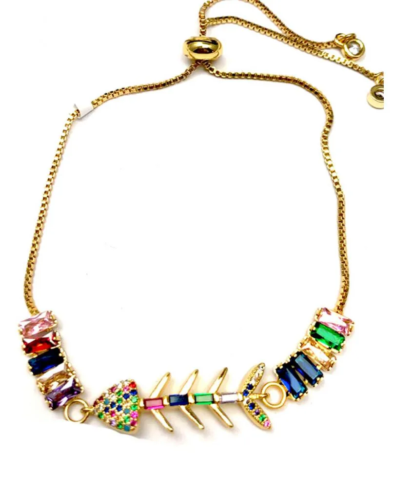 PULSERAS DORADAS CON TALLAS EN MULTICOLOR Y RASPA DE PESCADO