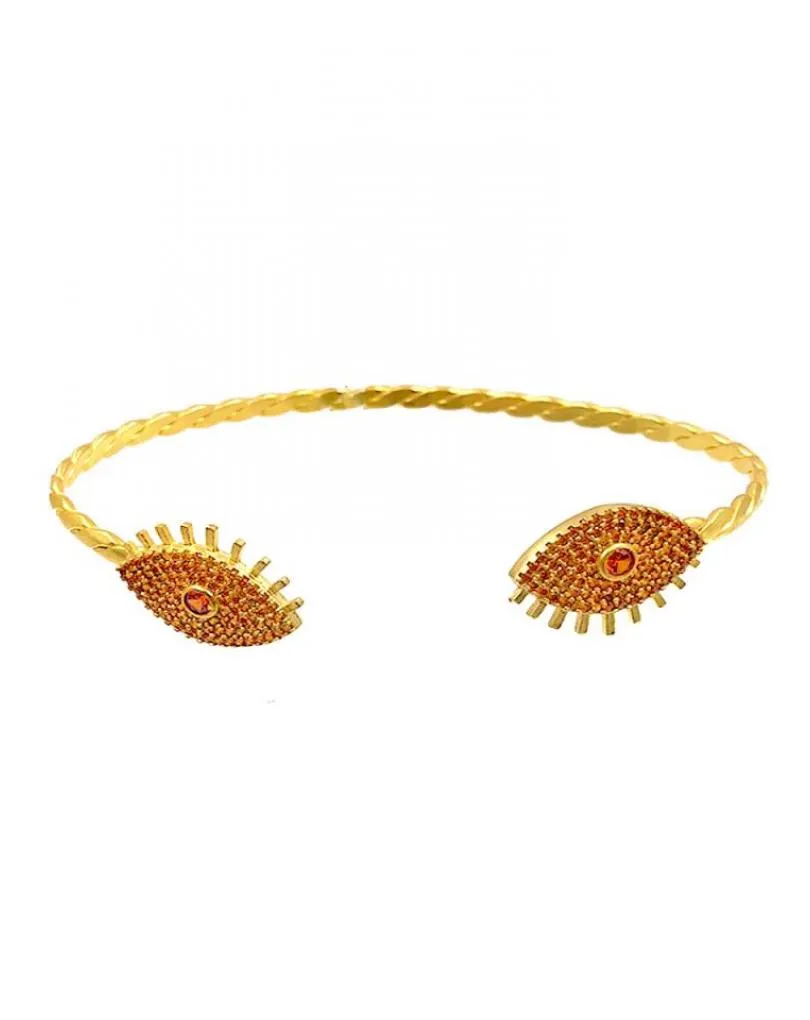 PULSERAS DORADAS Y NARANJAS CON OJO TURCO DE LA SUERTE