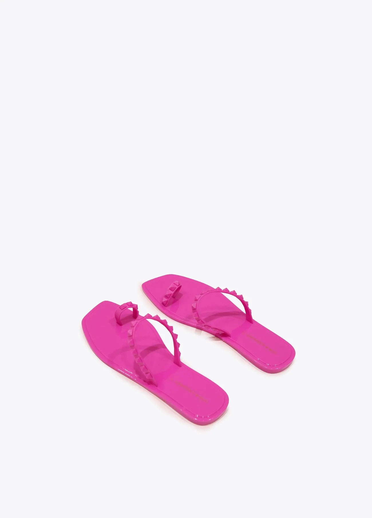 Sandalia plana dedo y tachas Fucsia Lola Casademunt